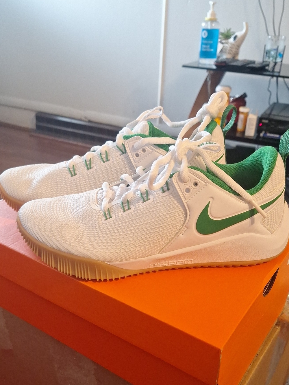 Nike White Athletic Trainers with Green Swoosh
